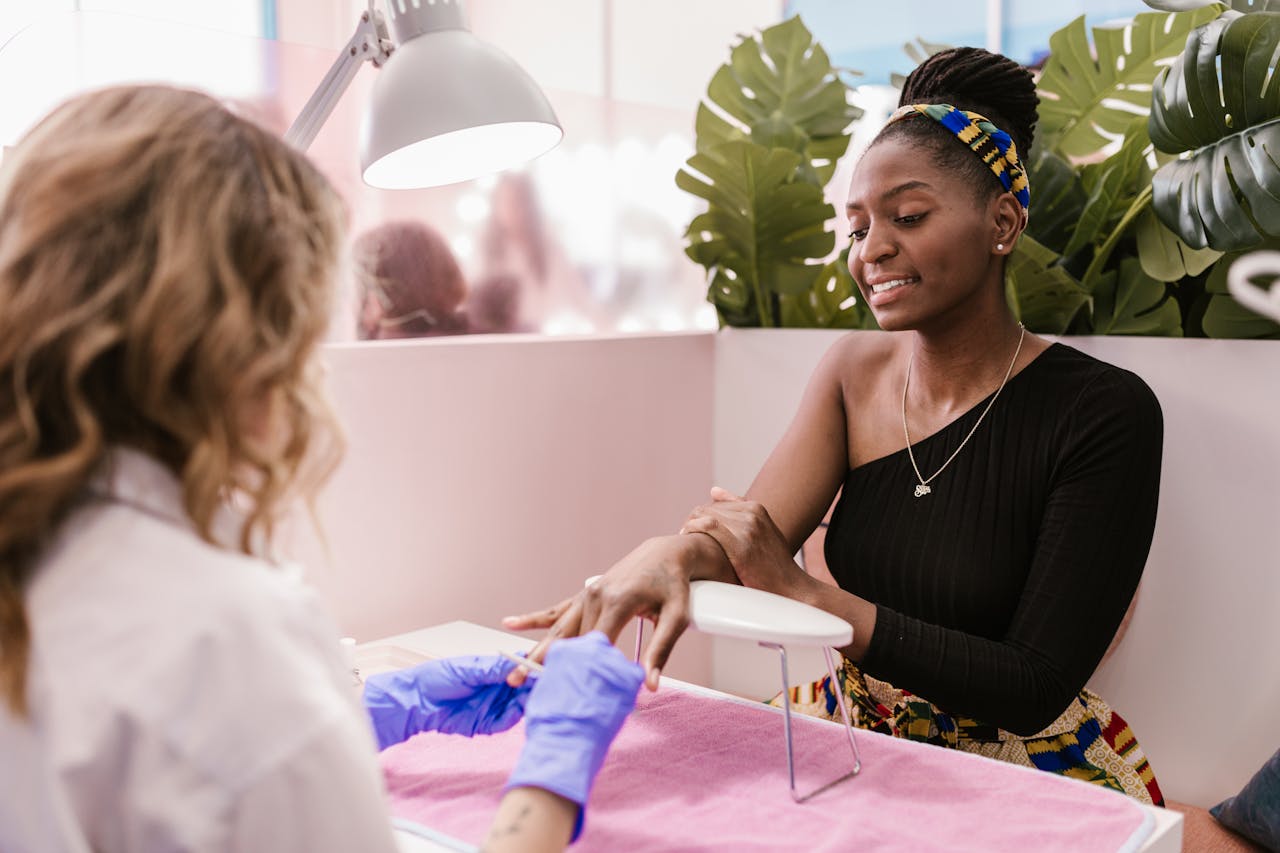 woman getting manicure